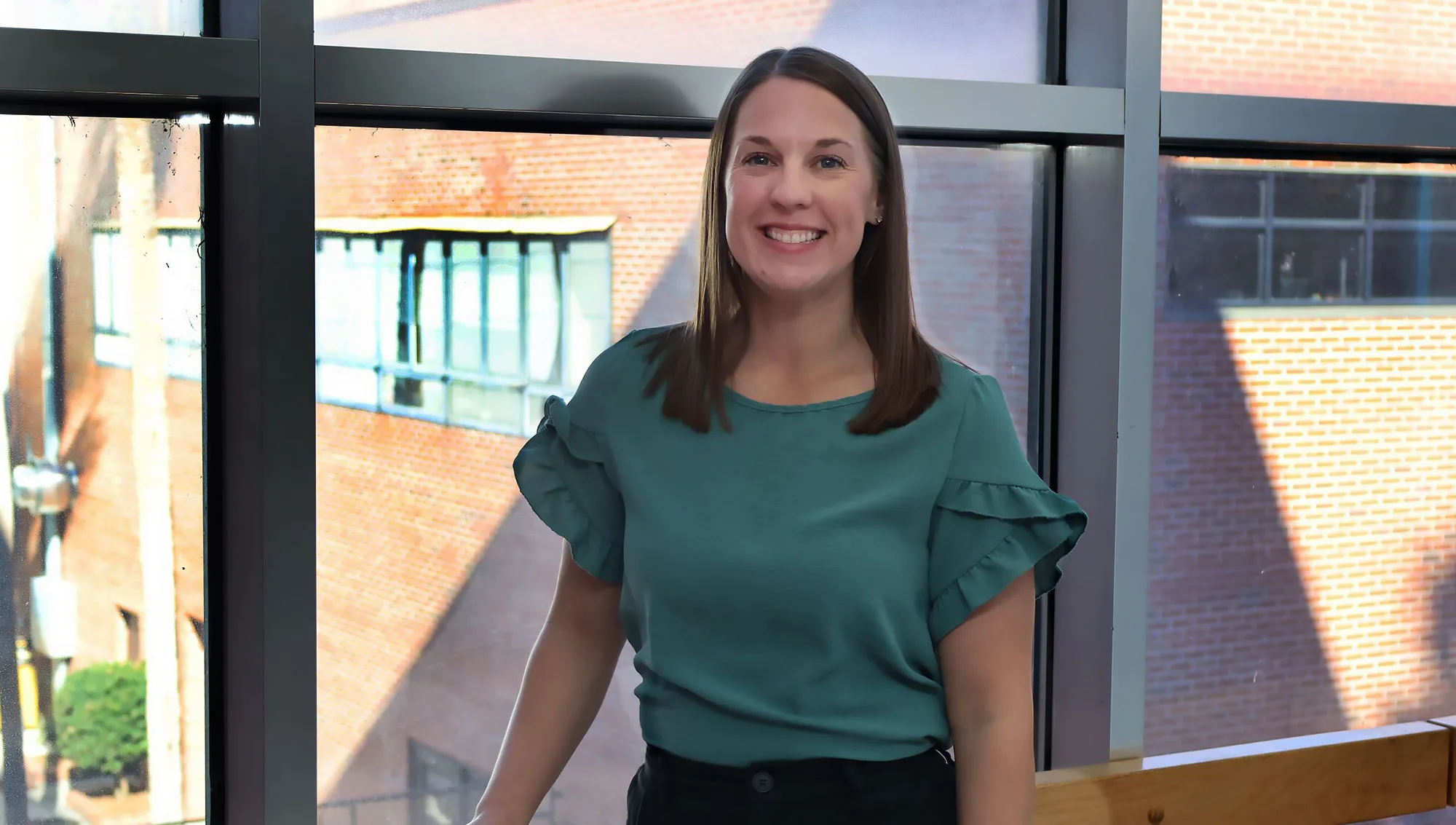 Amie Baisley assesses student assessments